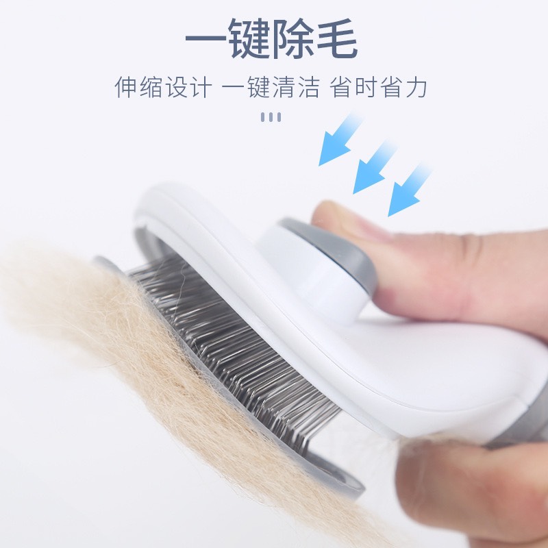 lược chải lông bấm nút cho mèo