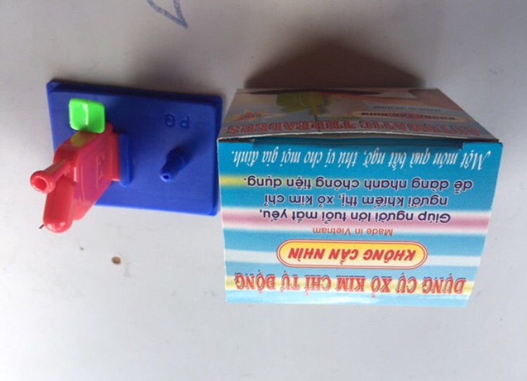 Dụng cụ sỏ kim chỉ tự động