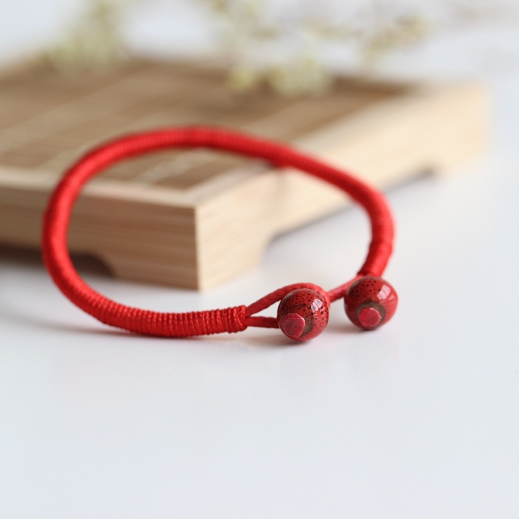 (HCM) Vòng Tay Gốm Chỉ Đỏ Phối Gốm May Mắn