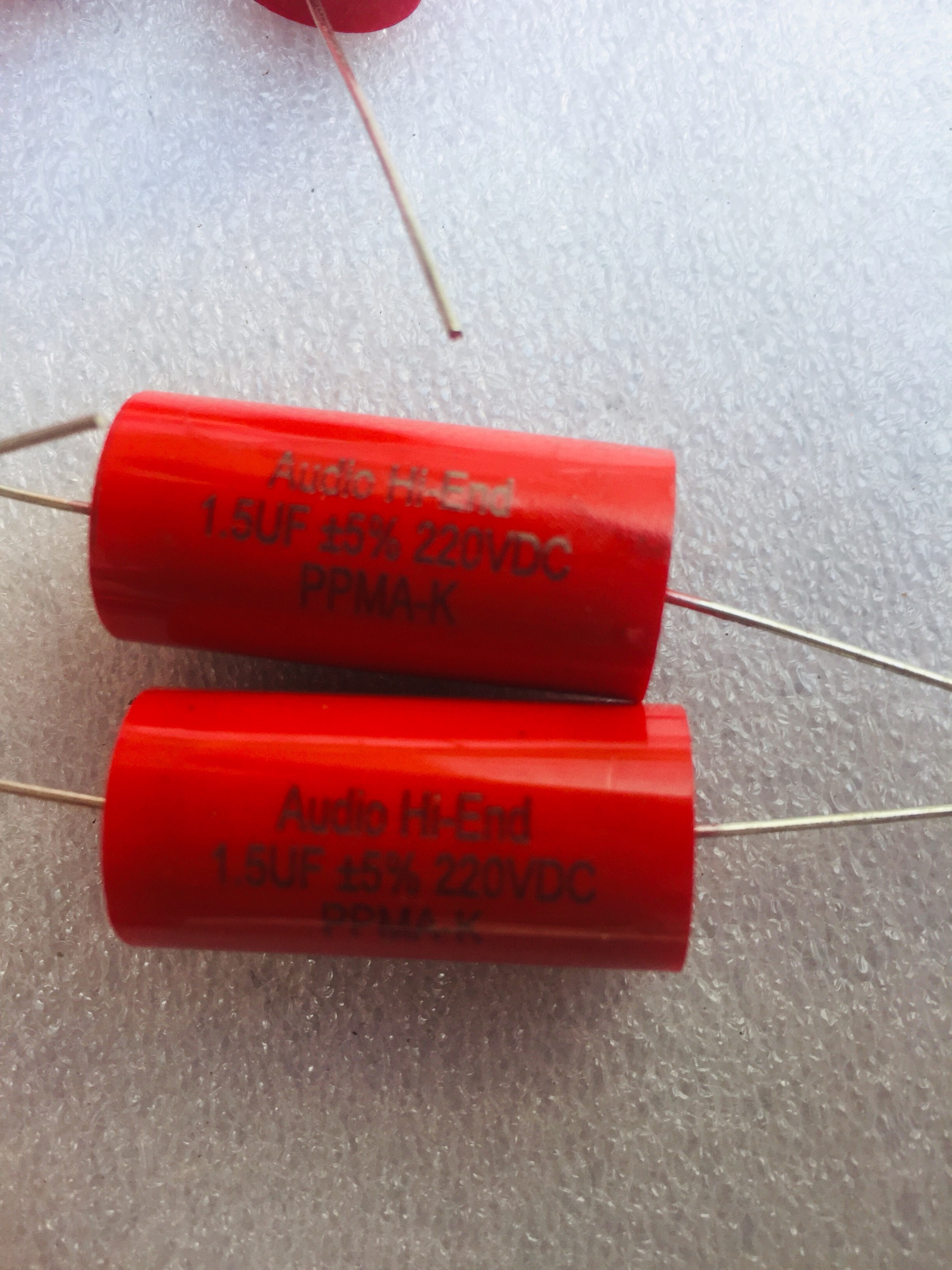 TỤ PHÂN TẦN LOA TREBLE 1.5MF 250V  ĐỎ  TRÒN - TỤ CHỐNG CHÁY
