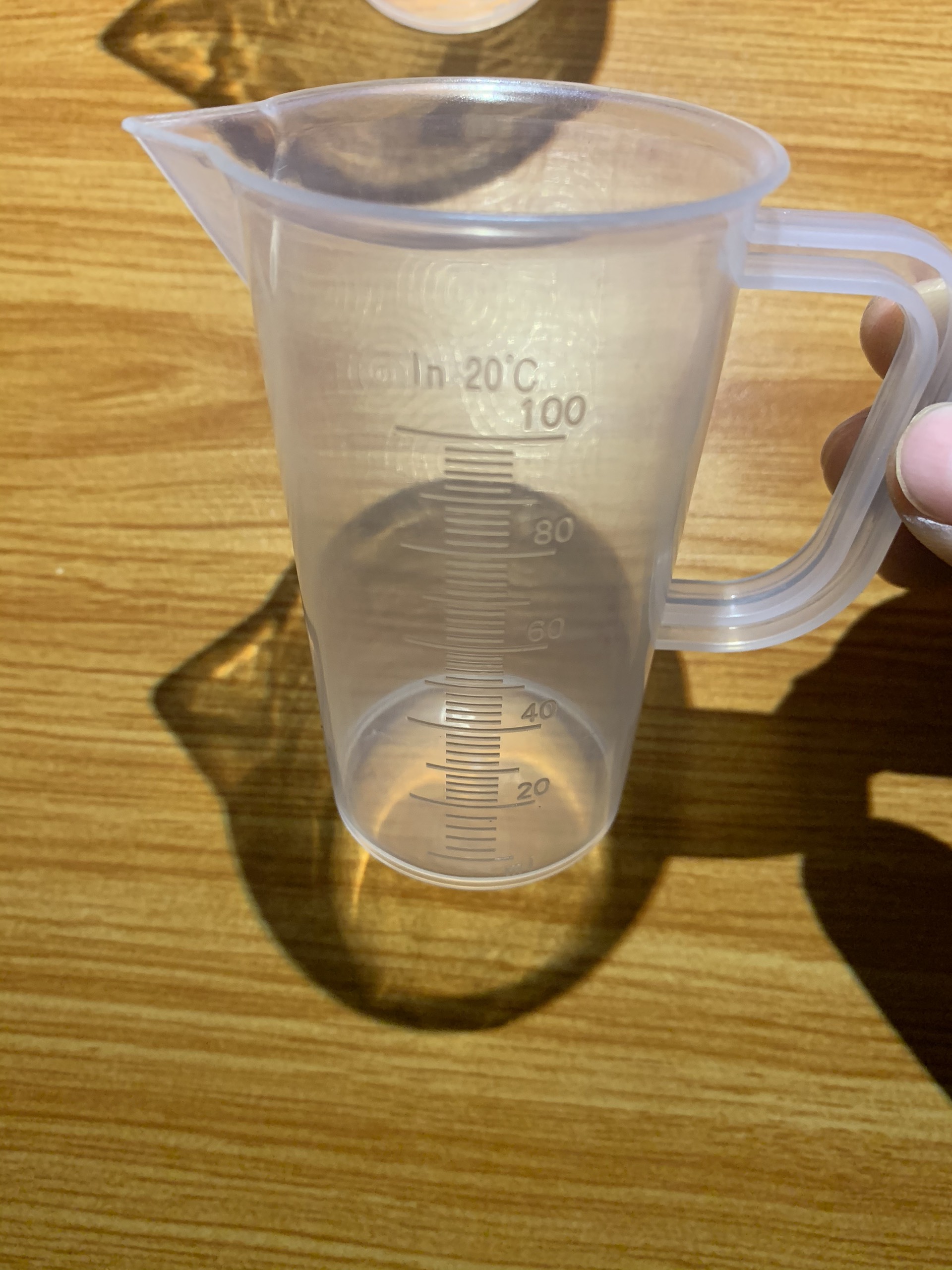 Cốc đong nhựa có quai 100ml
