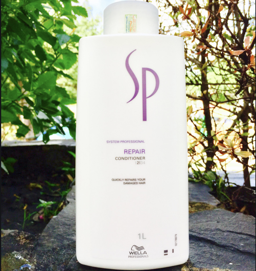 Dầu xả chăm sóc tóc hư tổn sp wella repair conditioner 1000ml
