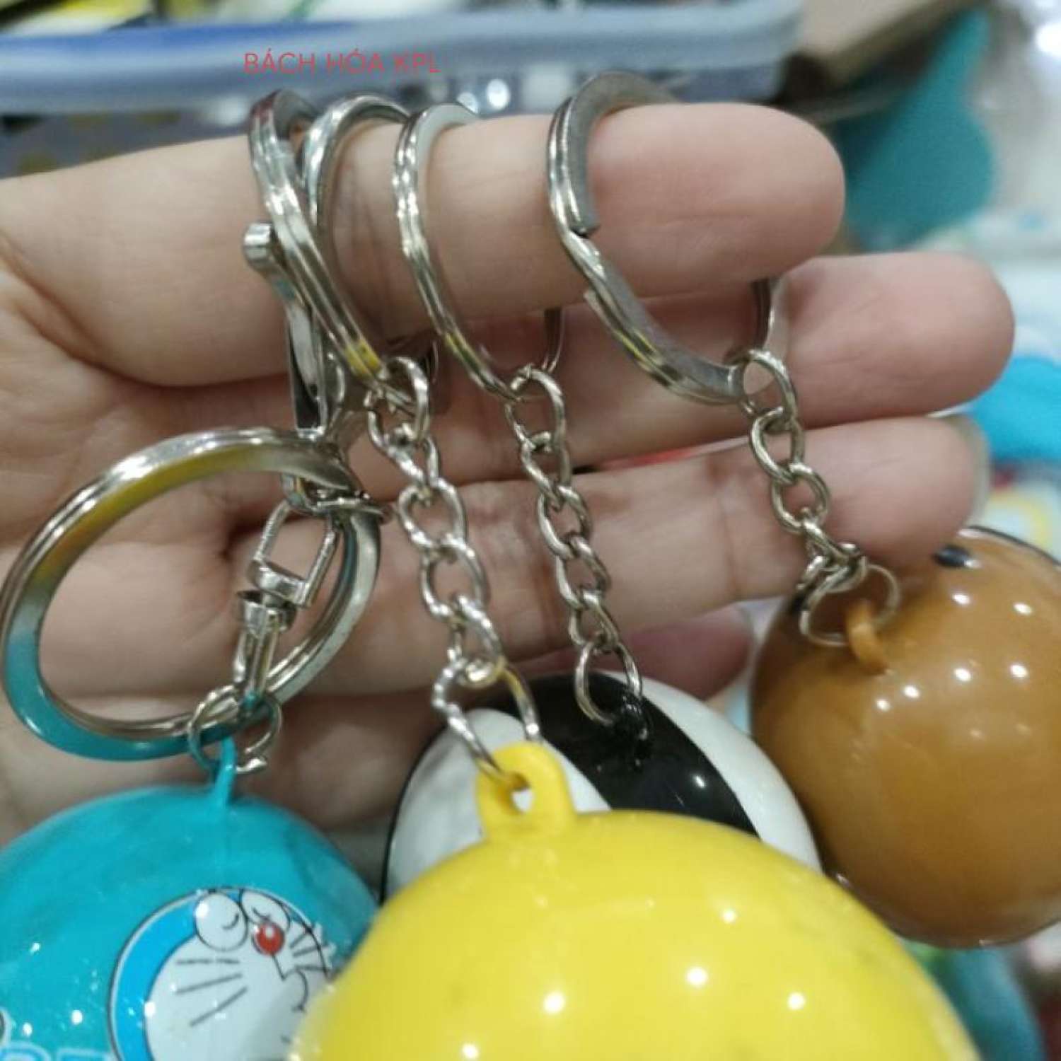 Móc khóa Doraemon đội nón bảo hiểm