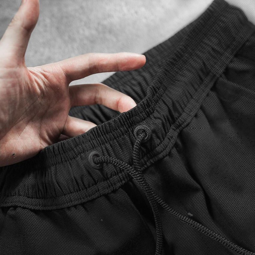 Quần jogger nam vải thun màu đen