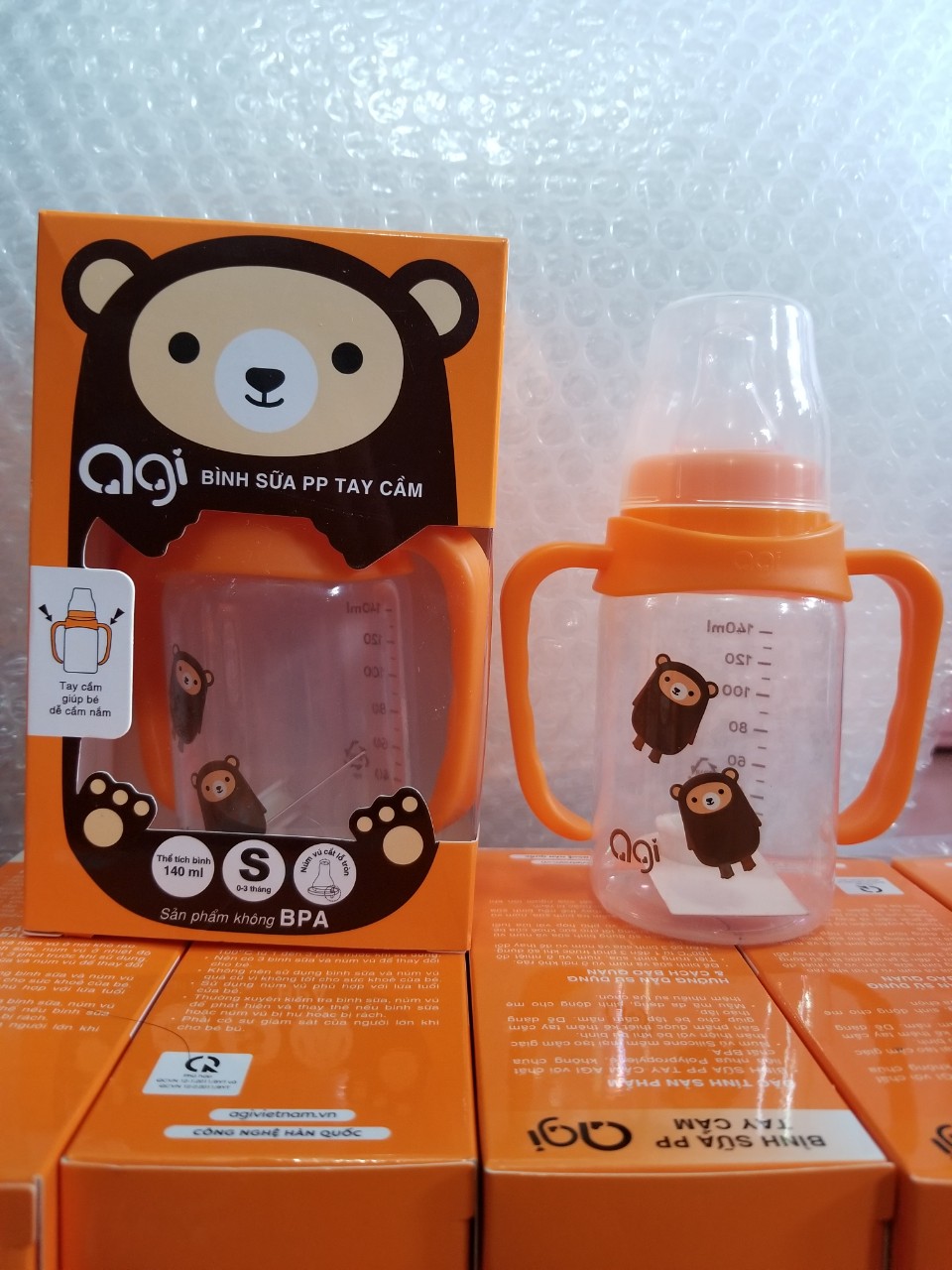 Bình sữa PP tay cầm AGI thể tích 140ml thích hợp cho bé 0 đến 3 tháng