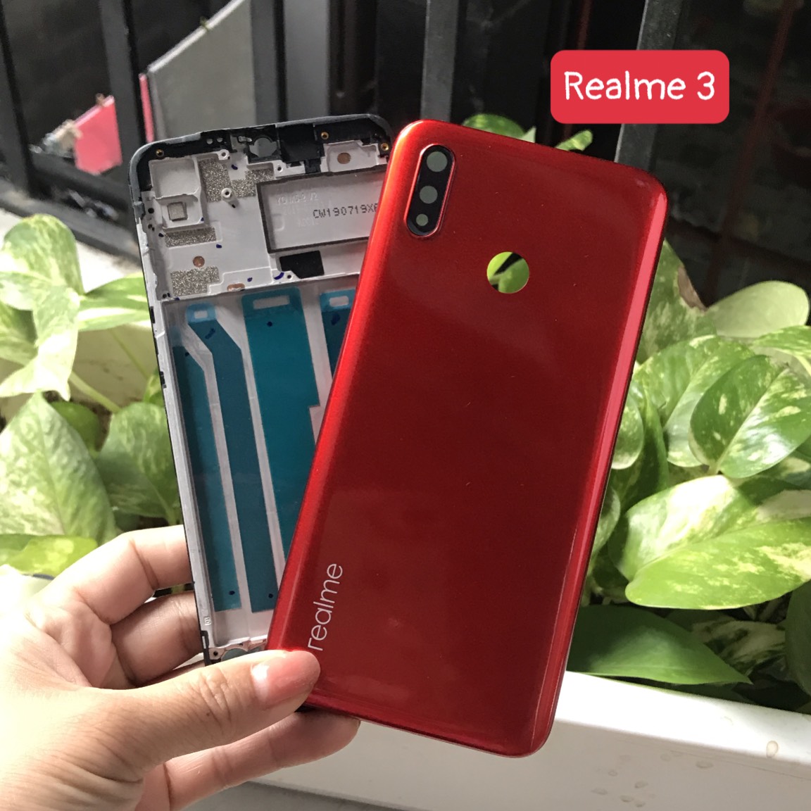 Bộ xương vỏ Realme 3 zin (bộ gồm lưng,sườn,nút bấm,kính camera)