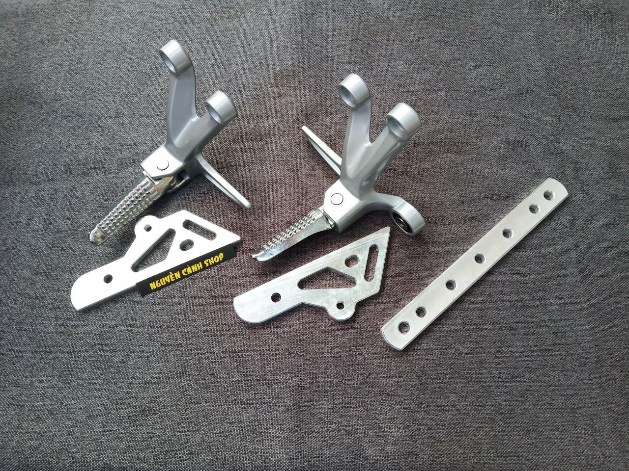 gác chân raider gắn exciter 135