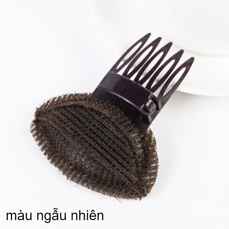 Kẹp làm phồng tóc mái.