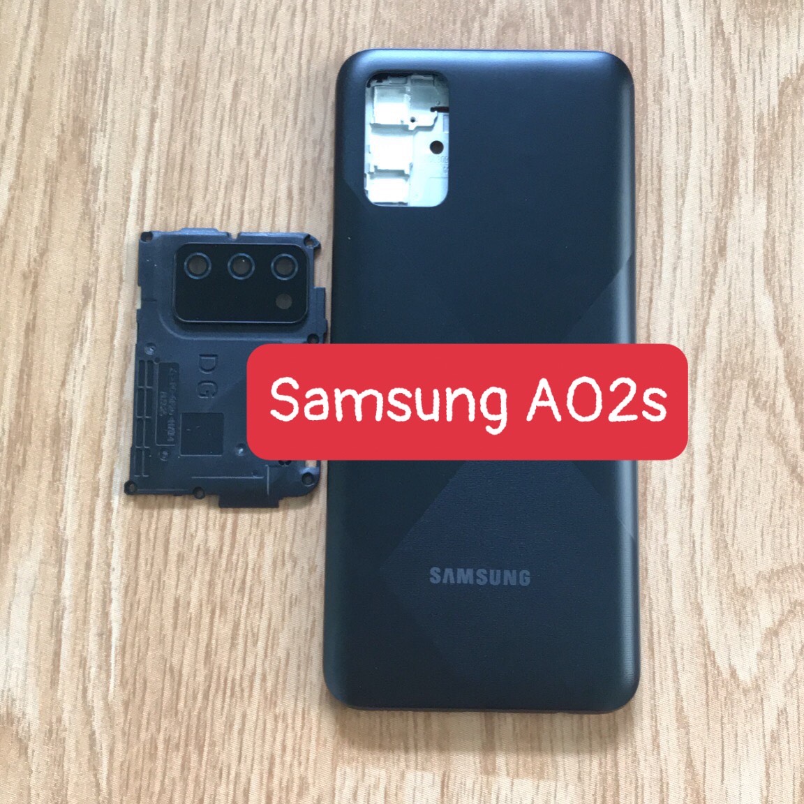 Bộ xương vỏ samsung A02s zin( kèm kính camera)