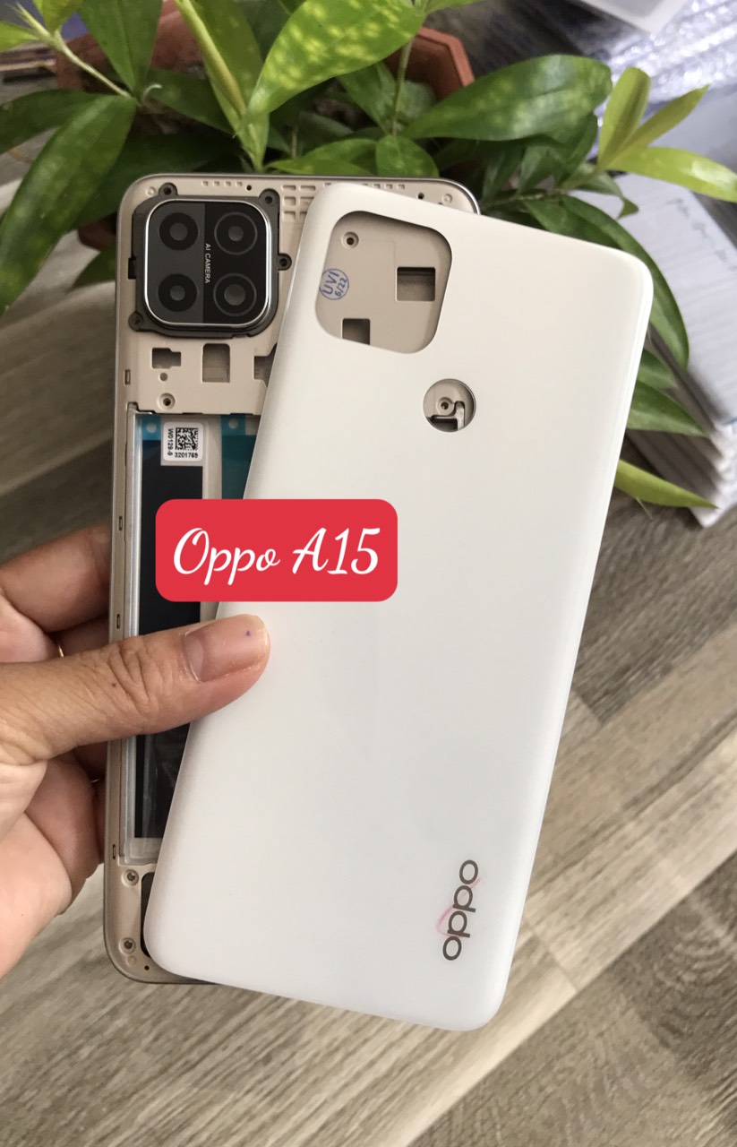 Bộ vỏ oppo A15 / A15s zin  (gồm lưng ,xương ,phím bấm,kính camera )