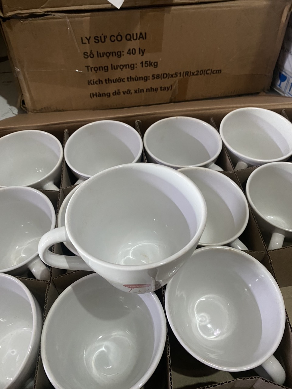 Ly sứ có quai. Hàng Km coca-cola.