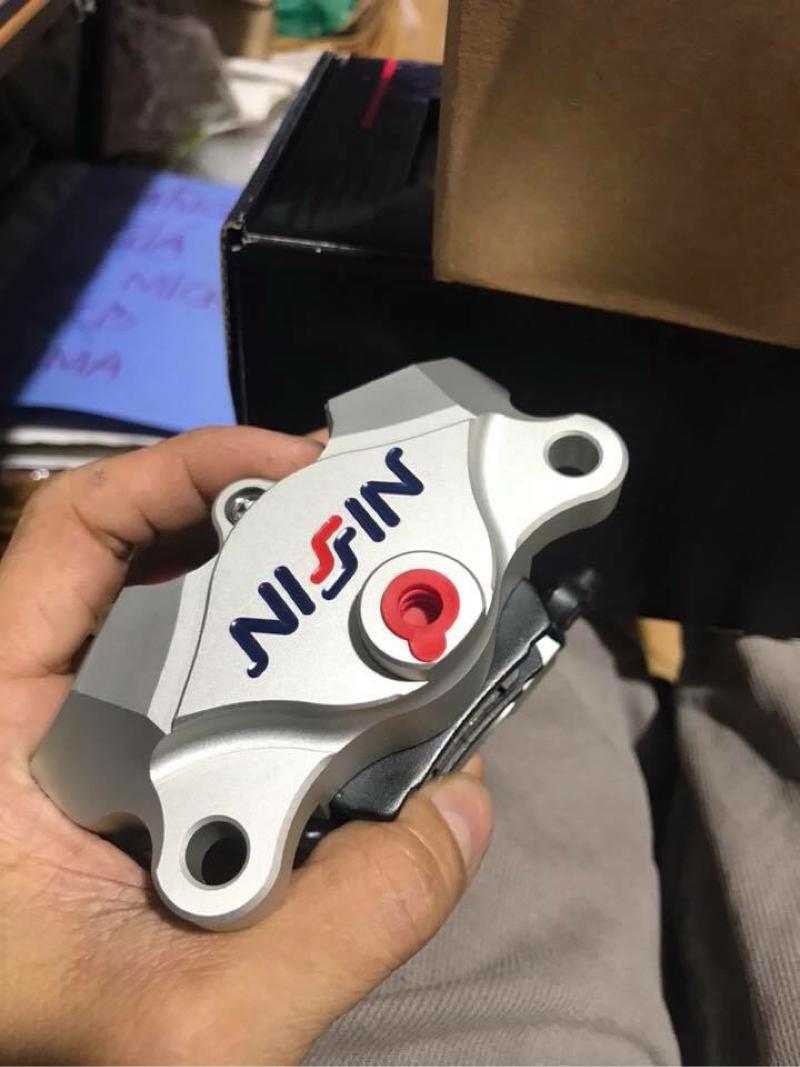 Heo dầu trước Nissin