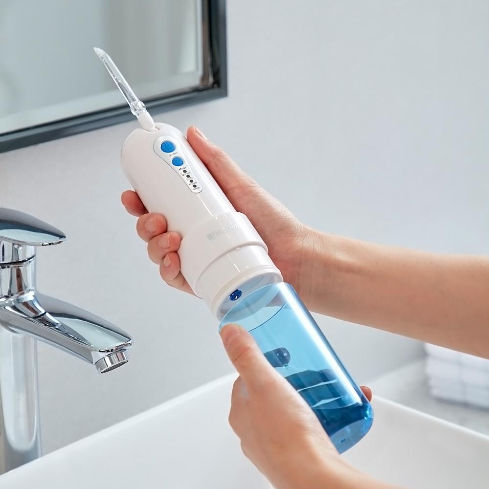 Máy tăm nước du lịch