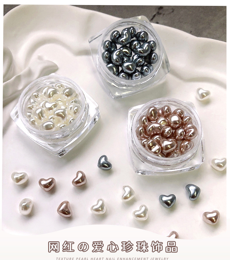 Charm trái tim ngọc trai nổi trang trí móng (hũ)