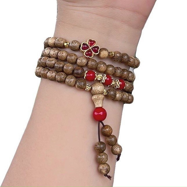 Vòng tay 108 hạt Trầm Tốc mix charm cỏ 4 lá may mắn