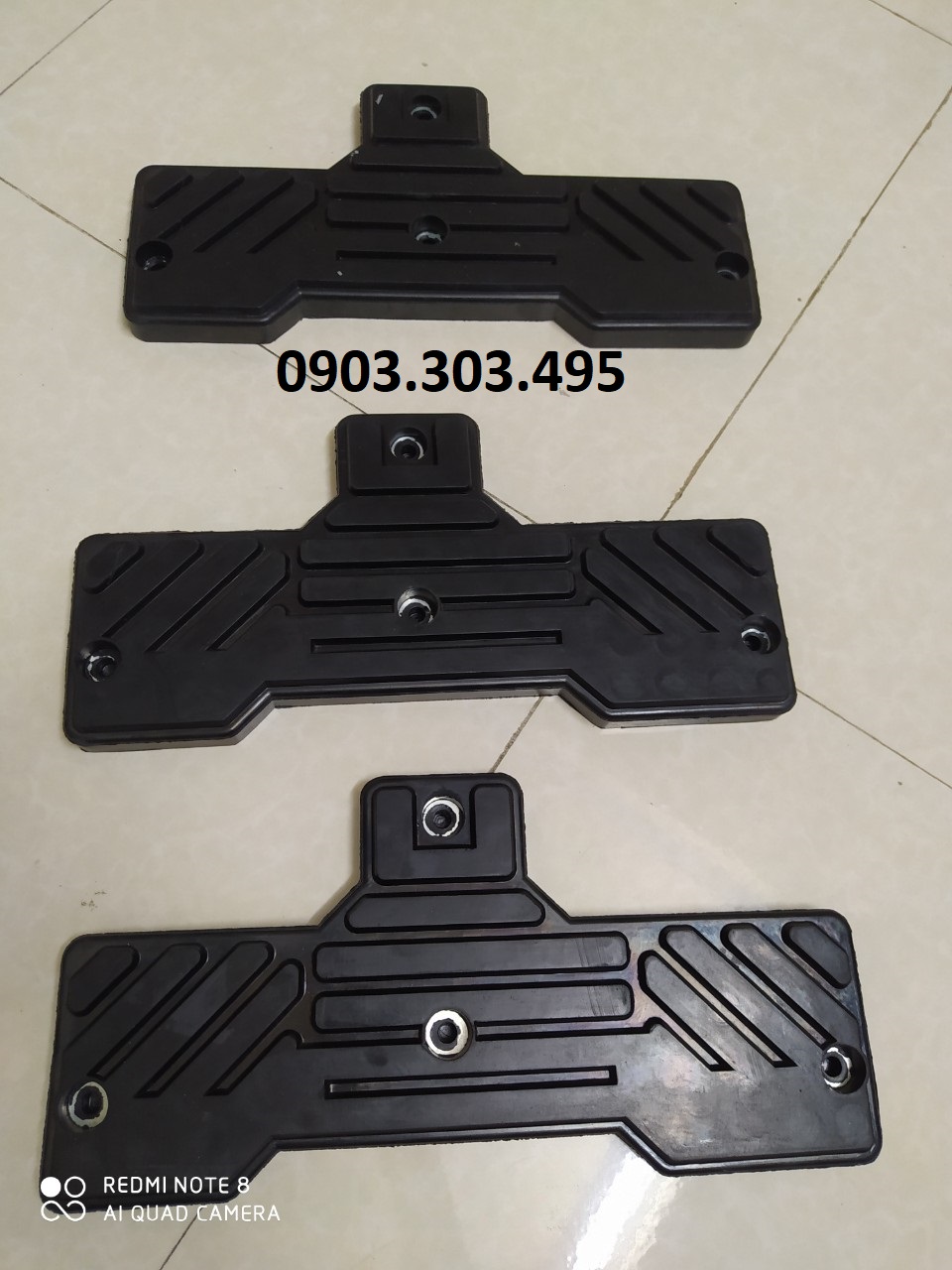 Miếng ép hông máy mở lốp