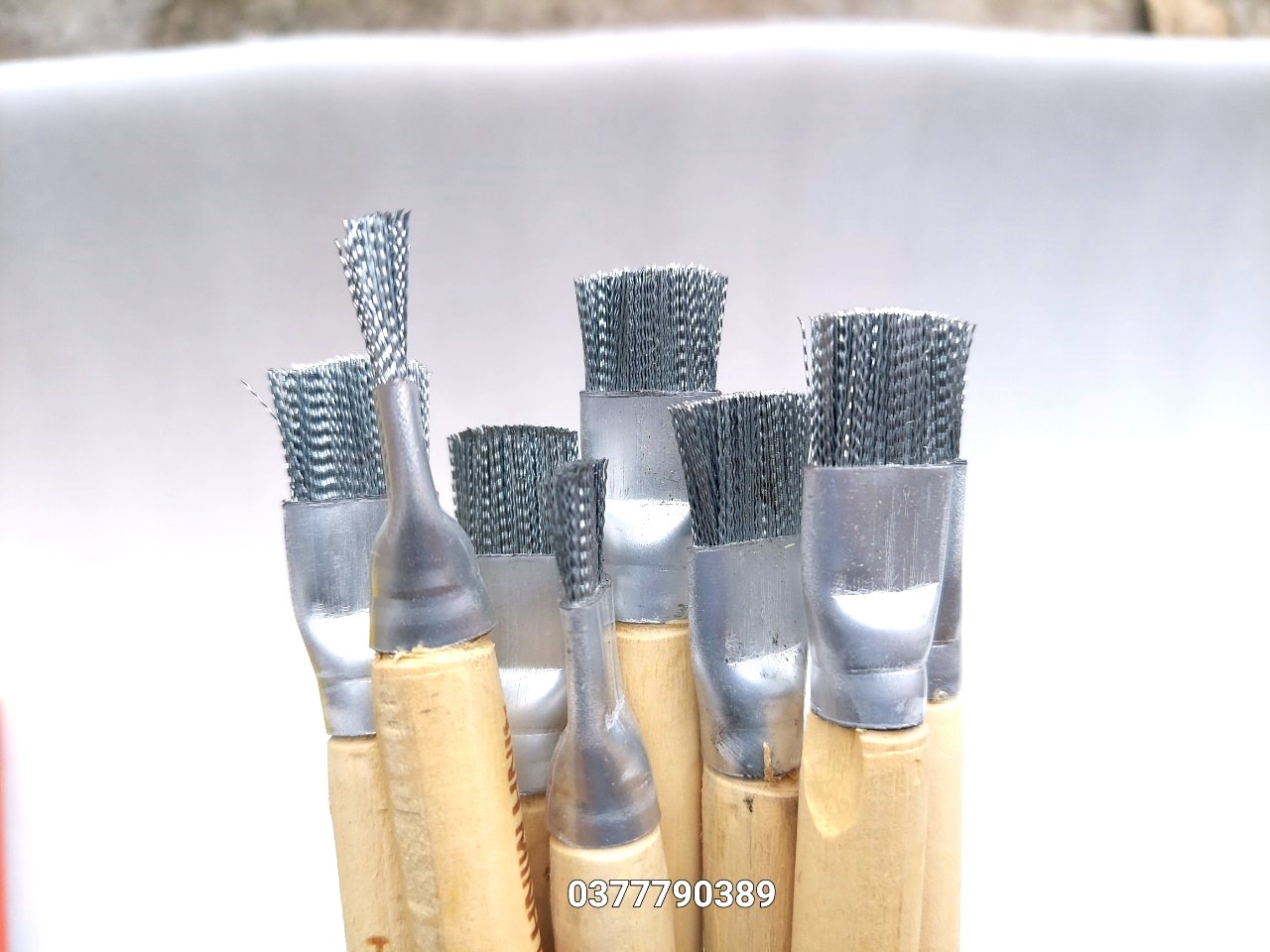 cọ sắt đánh rỉ