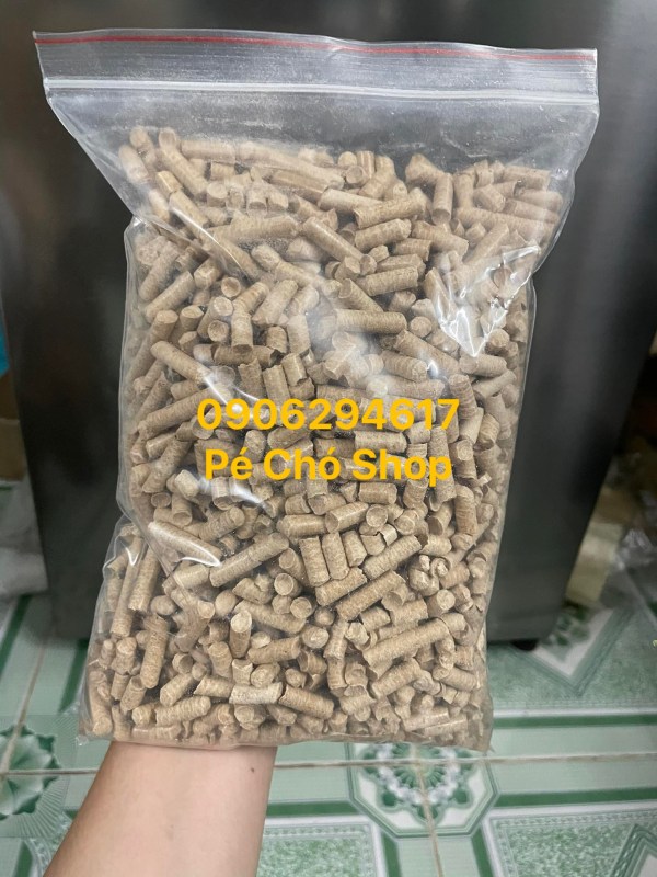 Gỗ nén vàng lót chuồng túi 1kg thú cưng ,có mùi thơm gỗ khử chuồng .