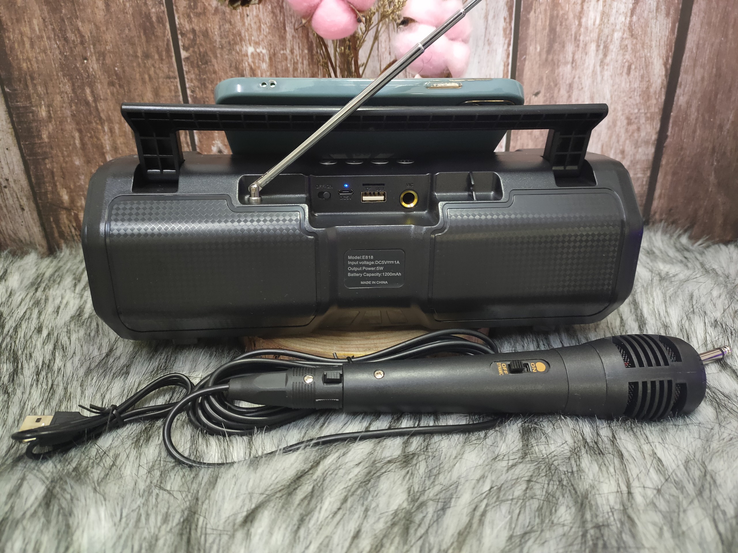 Km-s1 e818 Bluetooth karaoke speaker direct plug wired microphone karaoke speaker LED lamp strobe strong bass battery nice design 5D surround sound