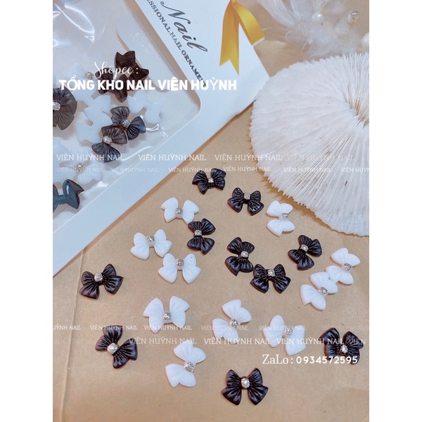 Set 20 cái nơ nhựa  gắn móng trắng đen