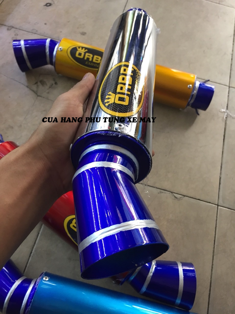 Lon pô ORBR F1 - không kèm cổ pô ( kèm lò xo + pát treo )