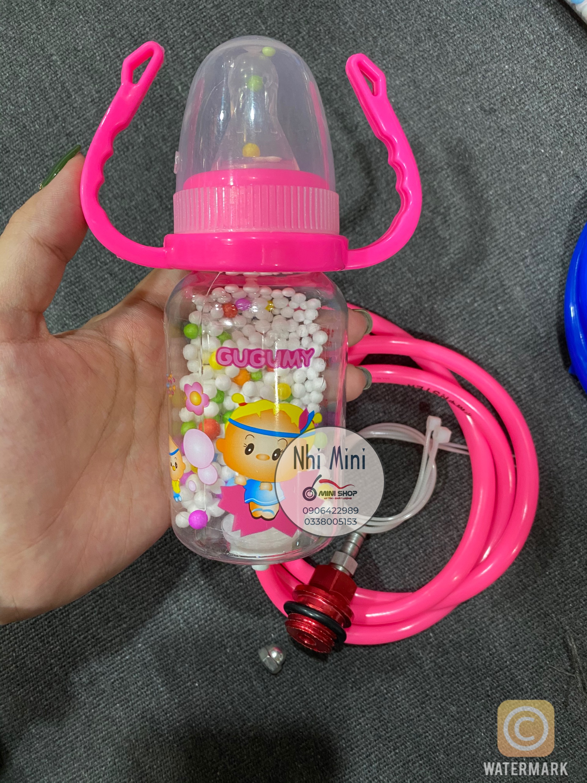 BÌNH SỮA THÔNG HƠI XE MÁY (MÀU HỒNG)