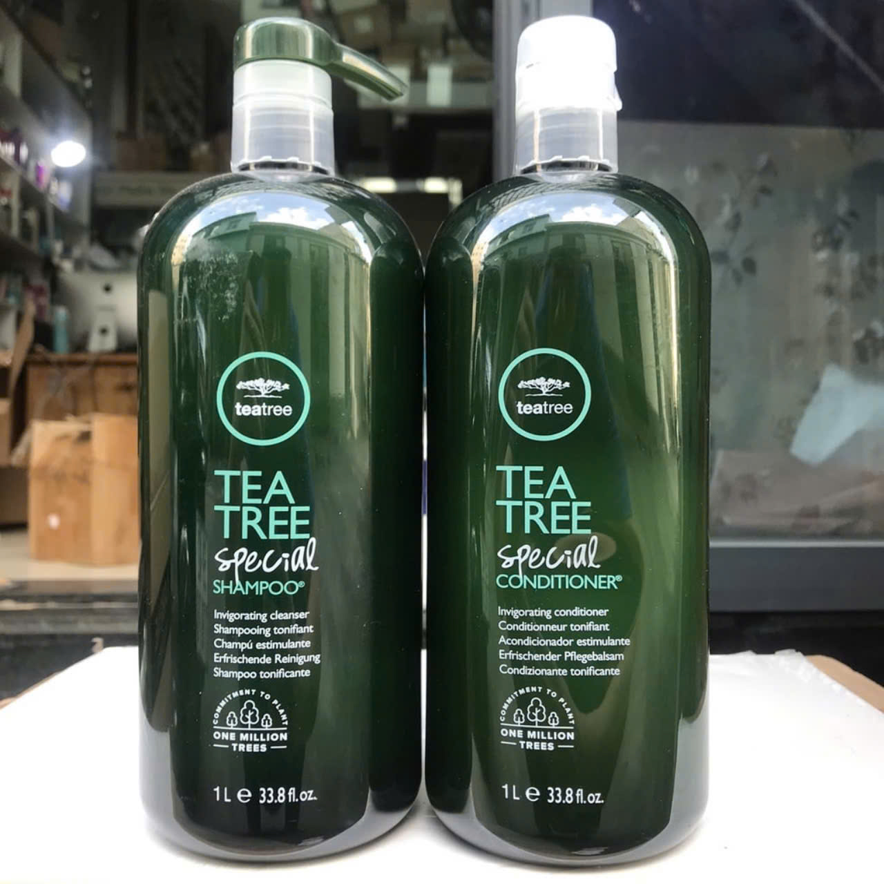 DẦU GỘI XẢ TRÀ XANH BẠC HÀ HỖ TRỢ TRỊI GÀU 1000ML, KHÁNG KHUẨN PAUL MITCHELL TEA TREE USA1000ml