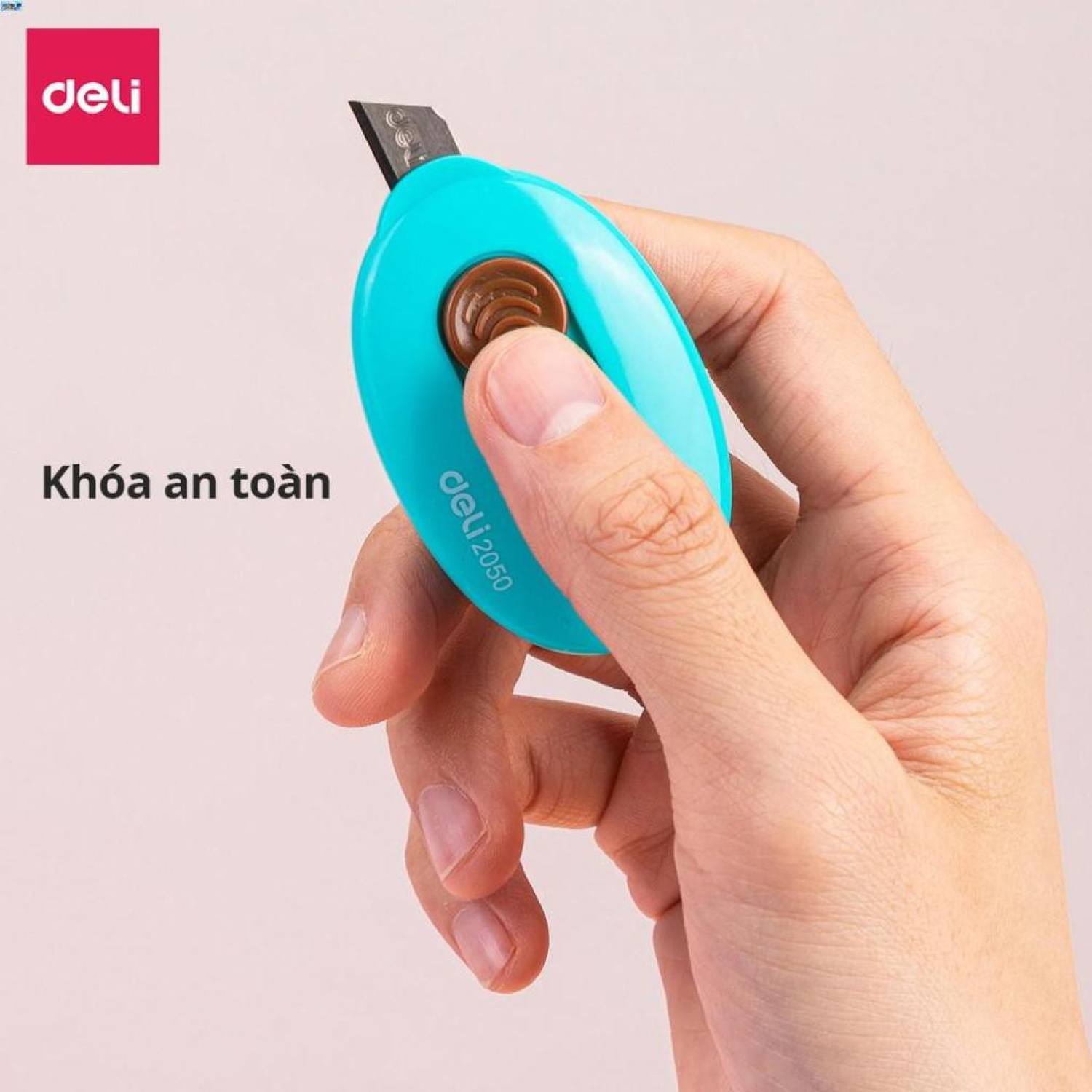 Dao rọc giấy mini 35mm Deli - E2050 .