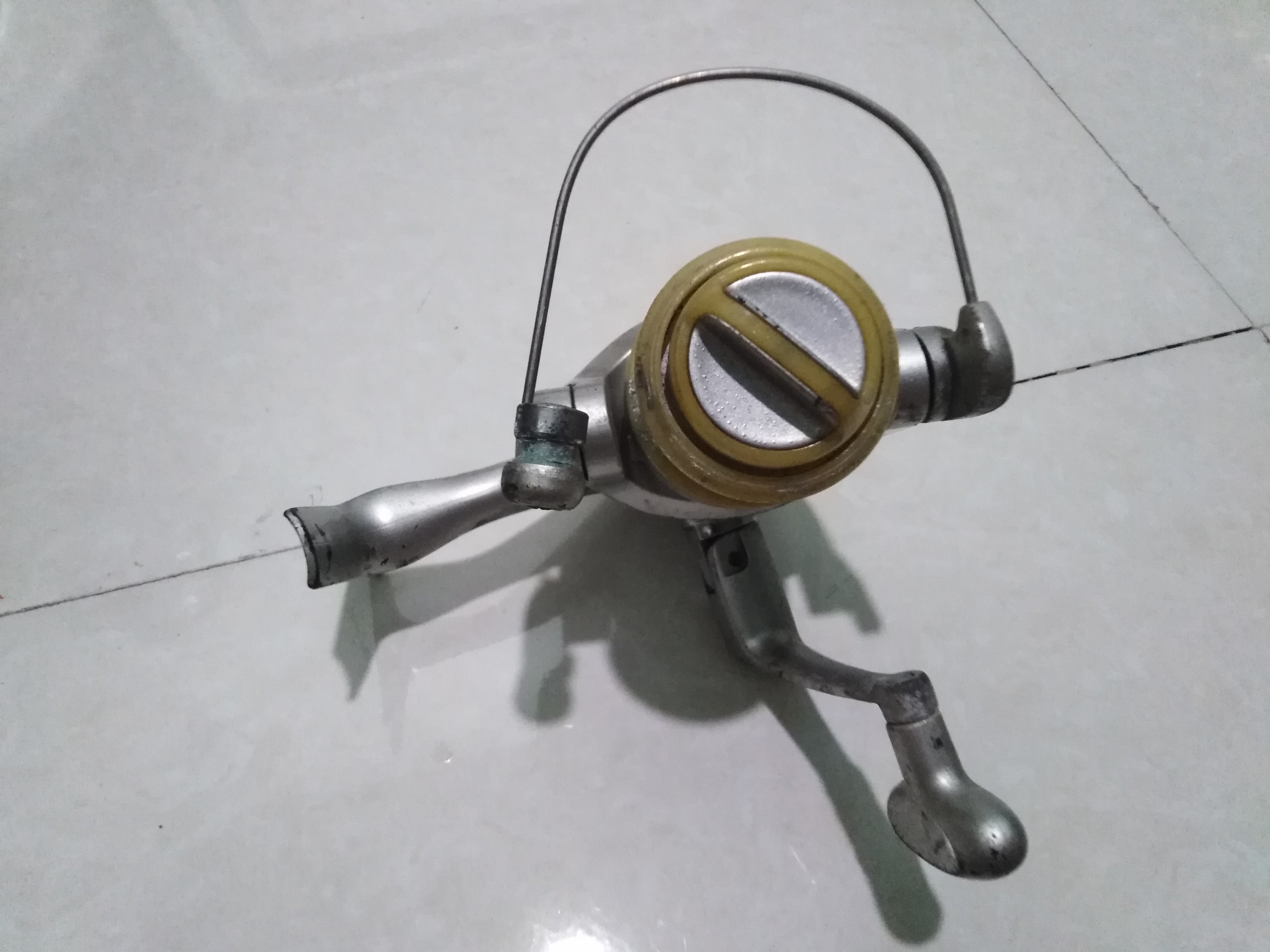 Máy câu bãi nhật one touch handle 1000