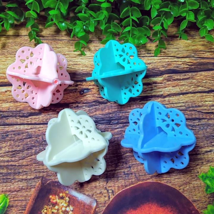 Banh Giặt Quần Áo SIÊU SẠCH. Dung cụ hỗ trợ máy giặt dạng trái xoay trog lòng máy giặt giúp đánh tan vết bẩn cứng đầu, chống dính và quay khô quần áo nhanh