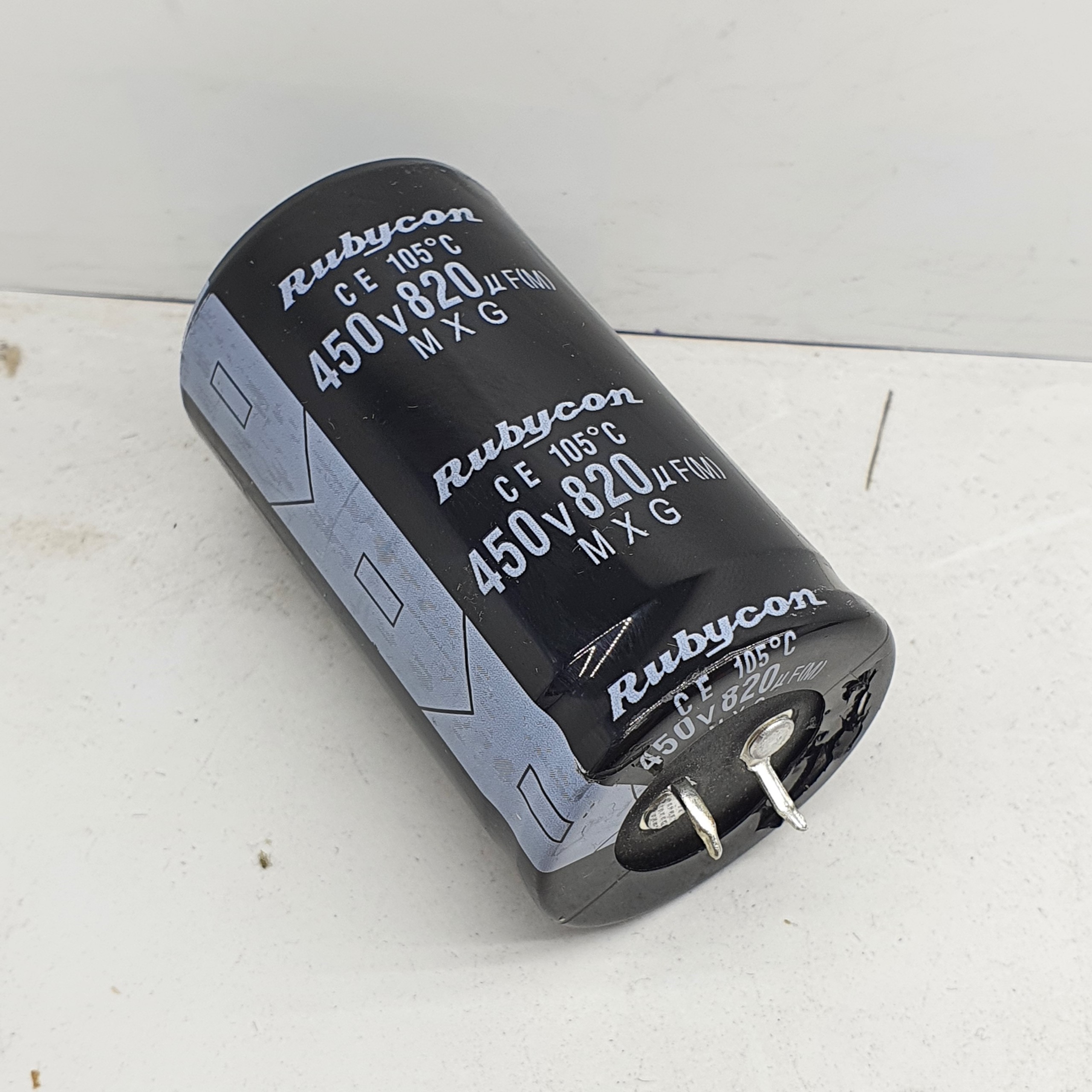 Tụ 820uF 450v tháo máy 35*60mm