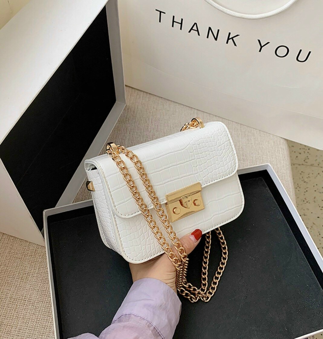 TÚI KHÓA BẤM SIZE 19CM DA RẮN TRƠN