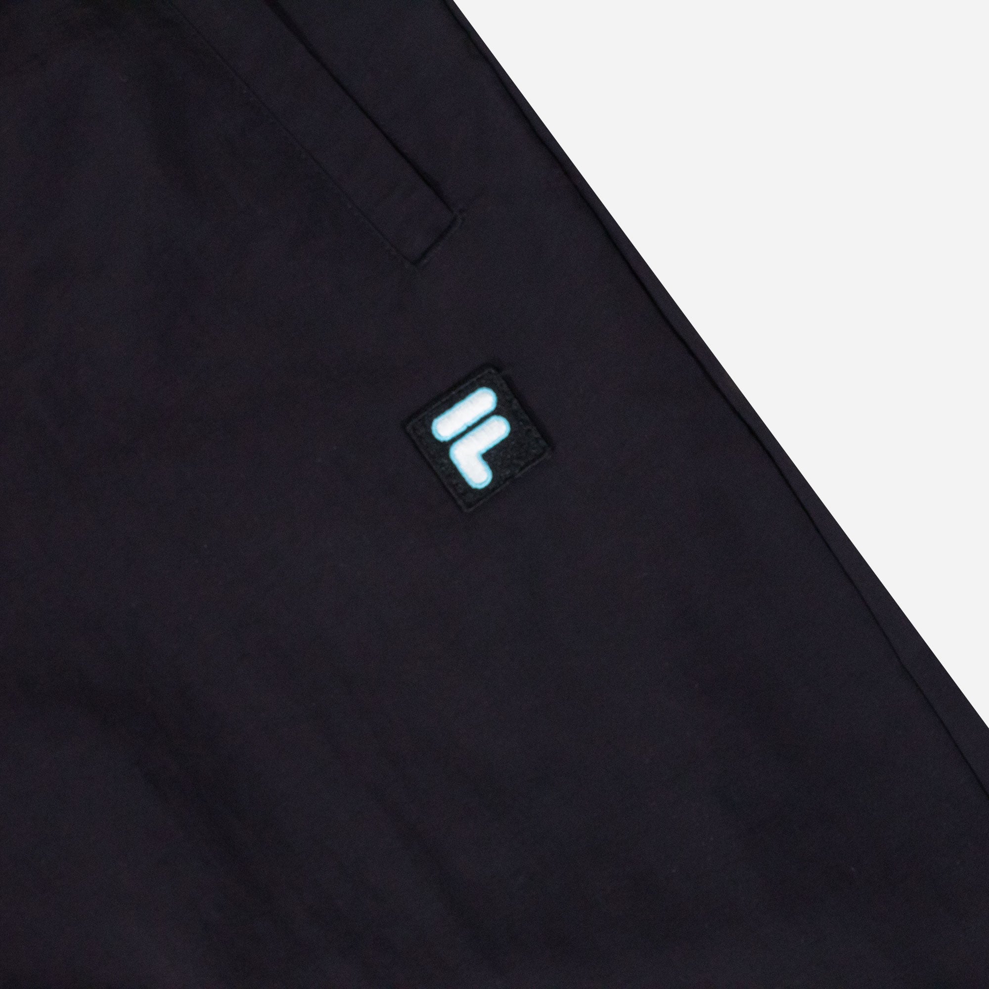 Fila Quần dài thời trang unise.x FW2PTE3080M-BLK