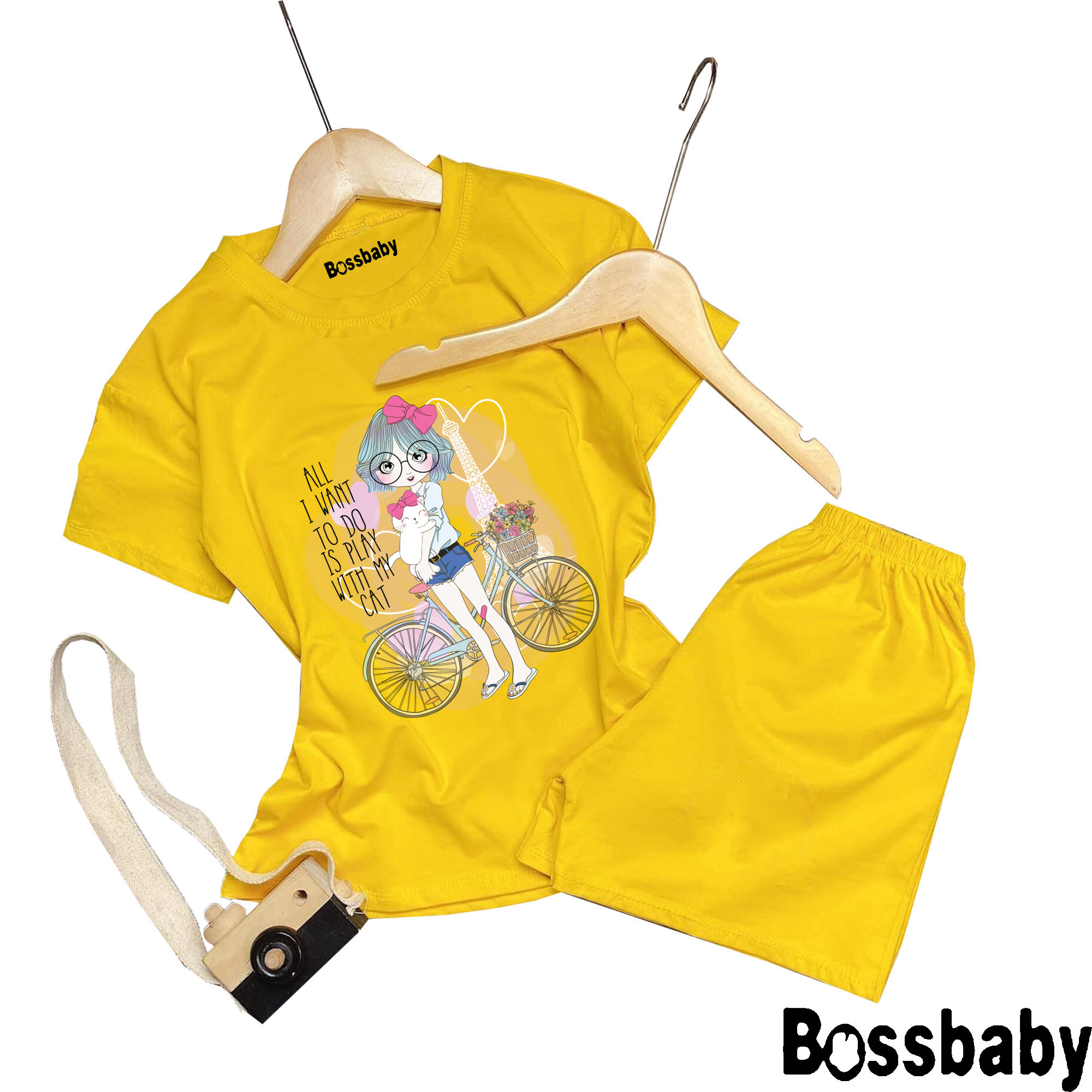 Bộ Áo Quần bé gái hình cô gái ôm thỏ cài nơ đứng bên xa đạp ,bộ bé gái từ 6kg-26kg.BDBG34.