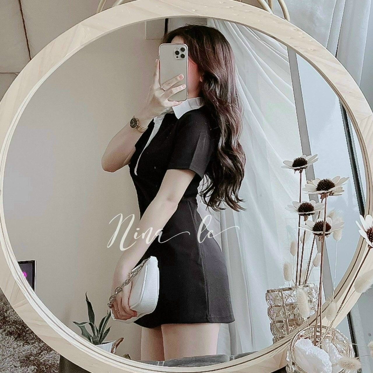 Đầm Polo đen cổ viền trắng