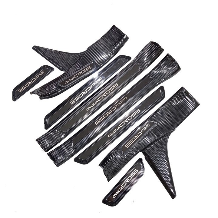 Ốp bậc cửa trong ngoài mẫu titan COROLLA CROSS new 8 chi tiết bảo vệ chống xước cửa Chất liệu inox phủ titan tăng sự sáng bóng, tạo điểm nhấn cho xe - Do choi xe hoi uy tin