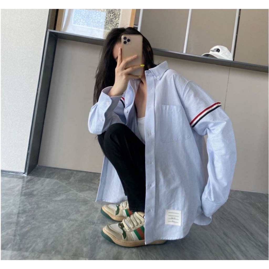 Áo sơ mi kẻ xanh, tay vạch quốc dân
