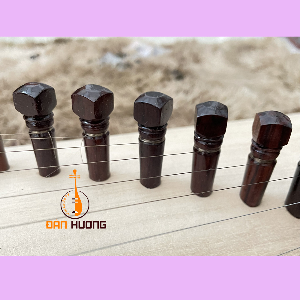 Trục lên dây đàn tranh