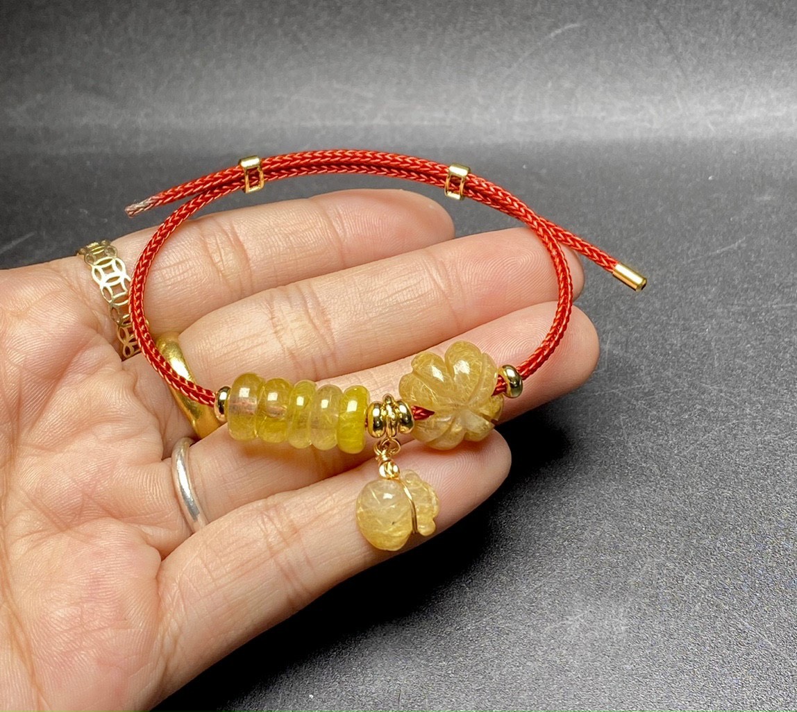 Vòng đeo tay, lắc đeo tay phong thủy mix cỏ bốn lá đá thạch anh tóc vàng