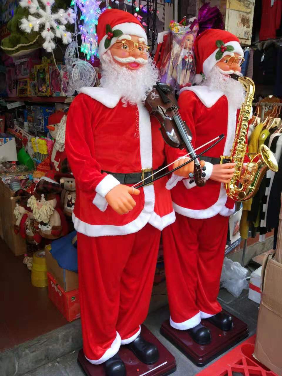 ÔNG GIÀ NOEL THỔI KÈN ĐIỆN