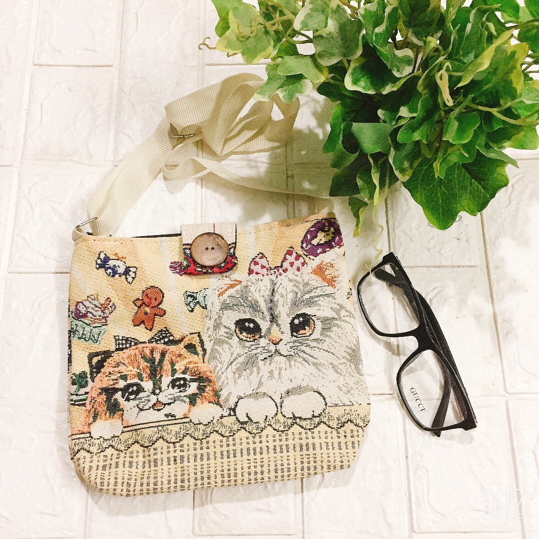 Túi thổ cẩm đeo chéo cúc dừa