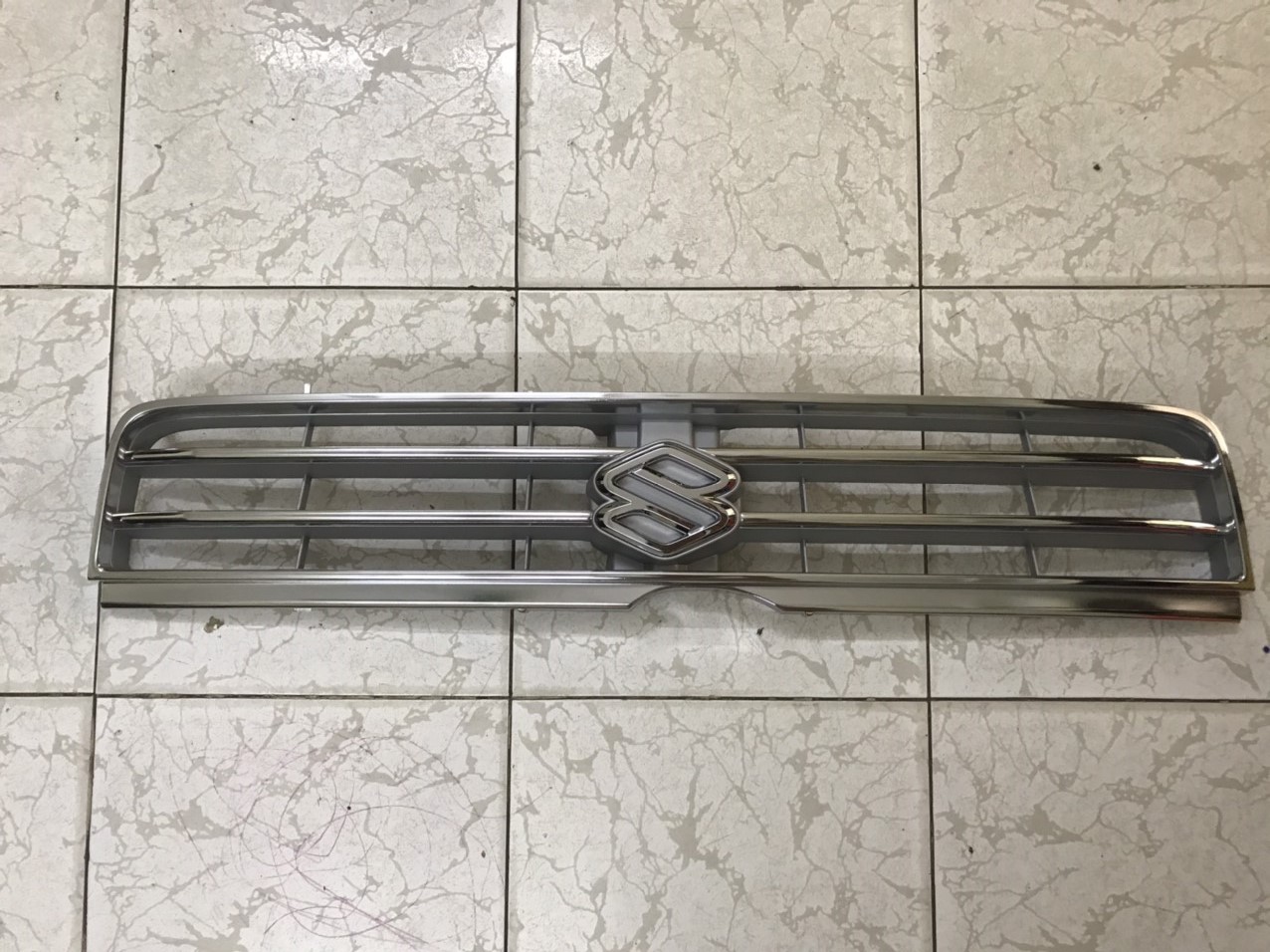 Mặt ga lăng Suzuki Wagon R+