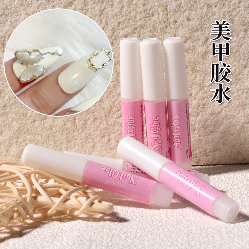 keo dán móng mini  keo dán nailbox 2g ( túi 10 tuýp) dán móng giả