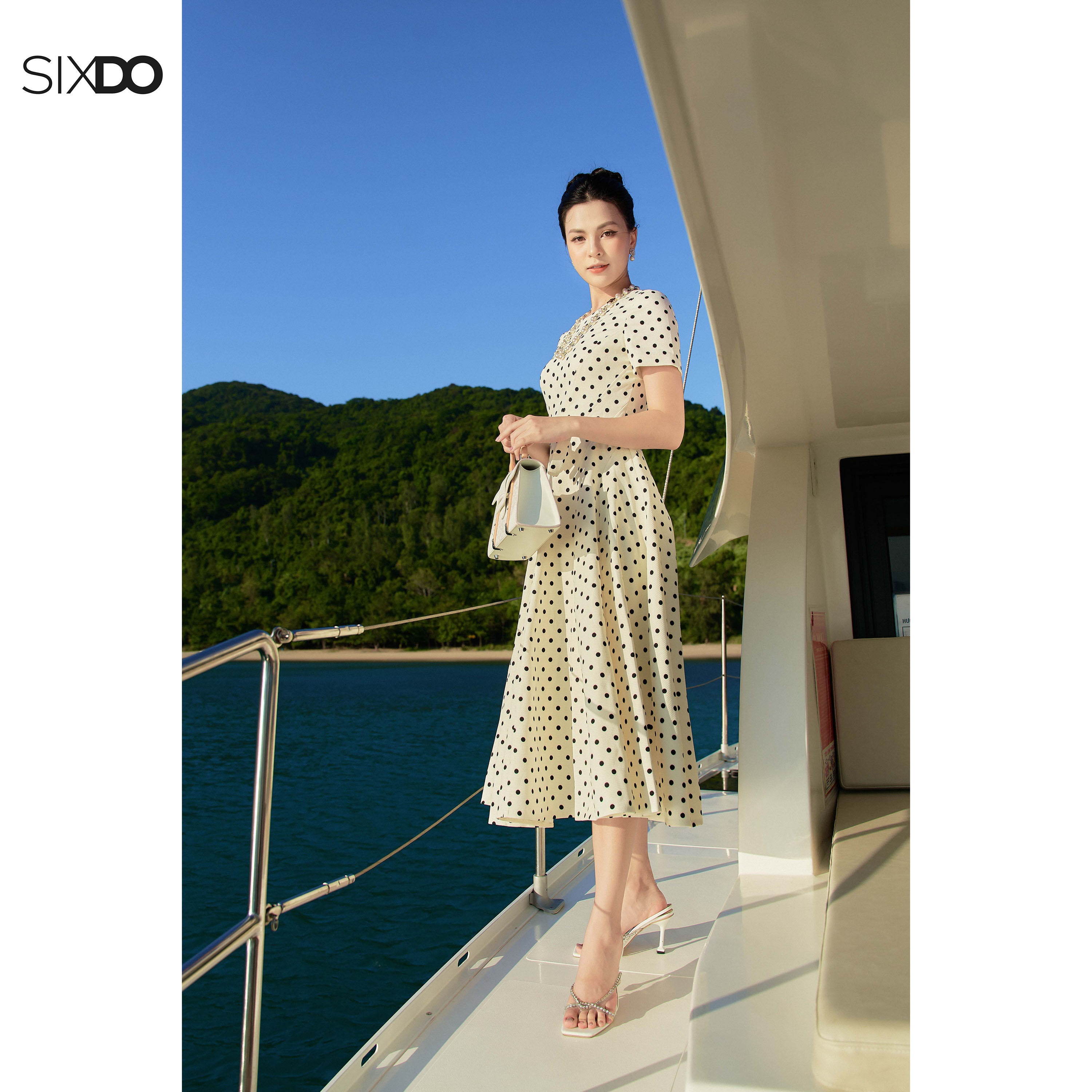 Đầm tô kem chấm bi đen SIXDO (Cream Polka Dots Midi Raw Dress)