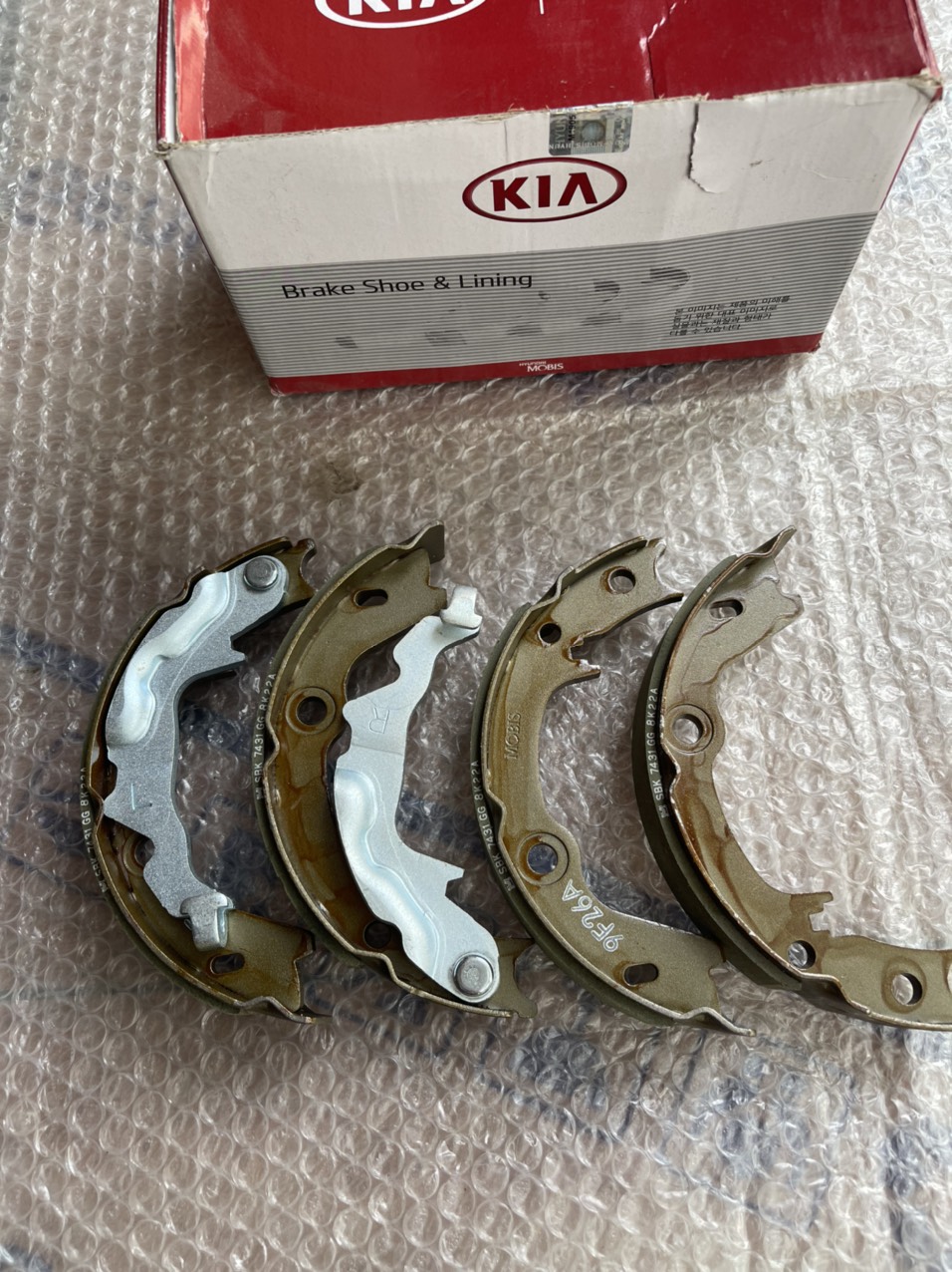 Má phanh tay Kia Forte, Cerato (Giá 1 Bộ ) Xịn