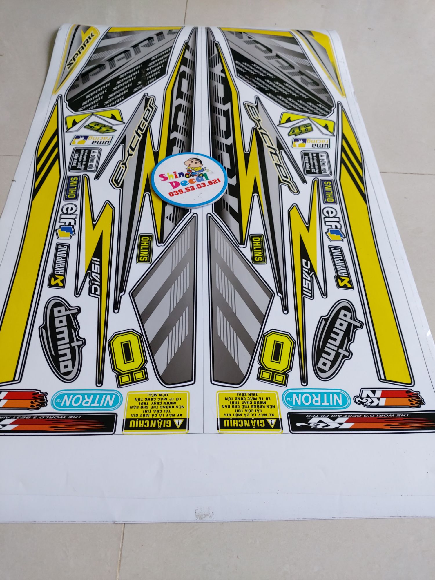 Tem exciter 2010 spark vàng đen