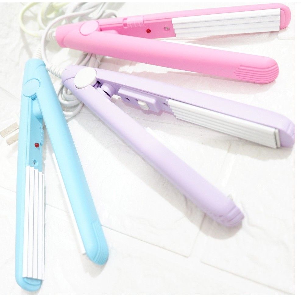 Bộ sản phẩm máy là tóc mini+ máy dập xù mini( Nhiều màu)