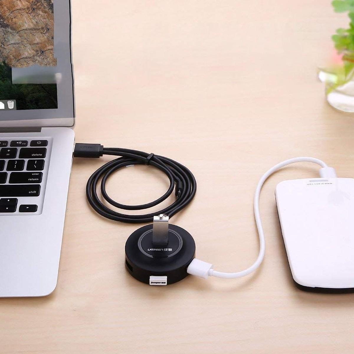 Hub USB 4 cổng 20 Ugreen + Micro USB hỗ trợ OTG (đen)