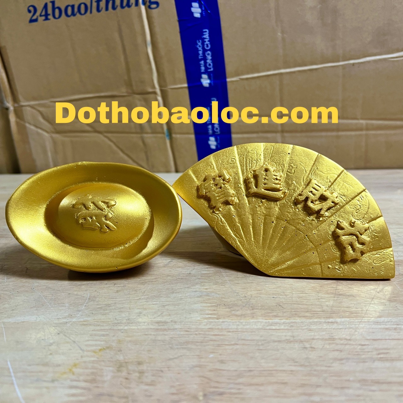 Thỏi vàng, quạt tượng di lặc bằng bột đá