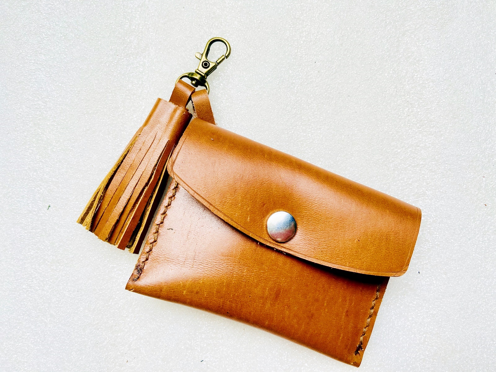 Ví móc khóa da handmade dây tua rua